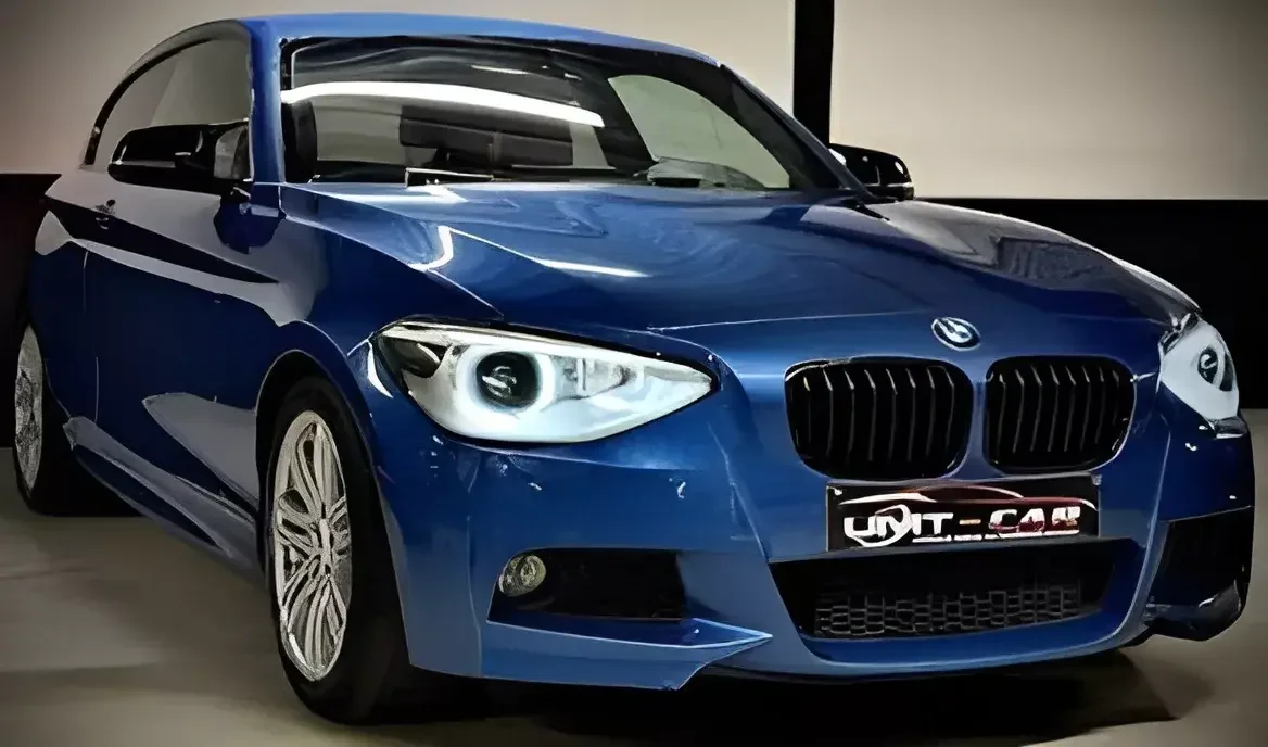 BMW 118i Benzine – Luxe & Comfort met Opendak en Navi!