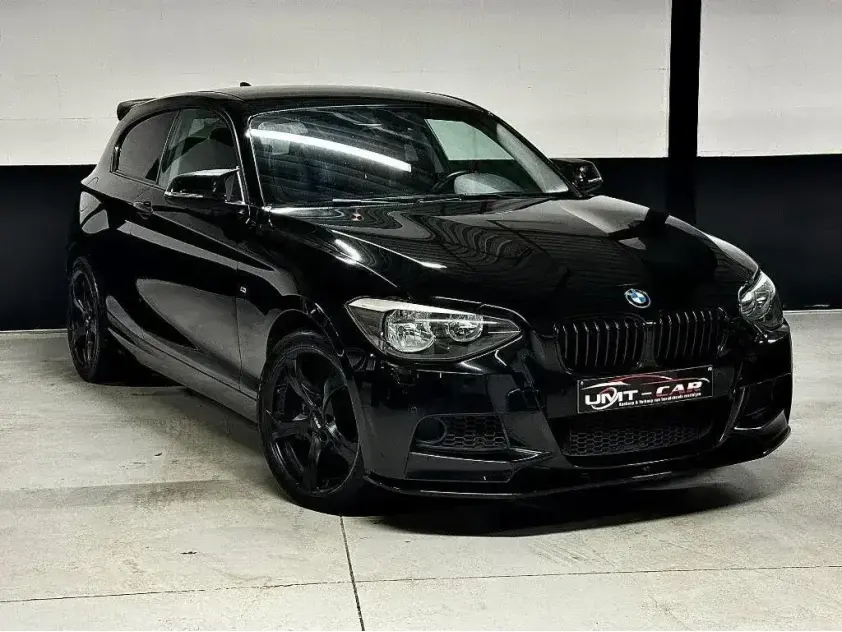 BMW 114i | Premium Hatchback | Handgeschakeld | 105 PK - Afbeelding 1